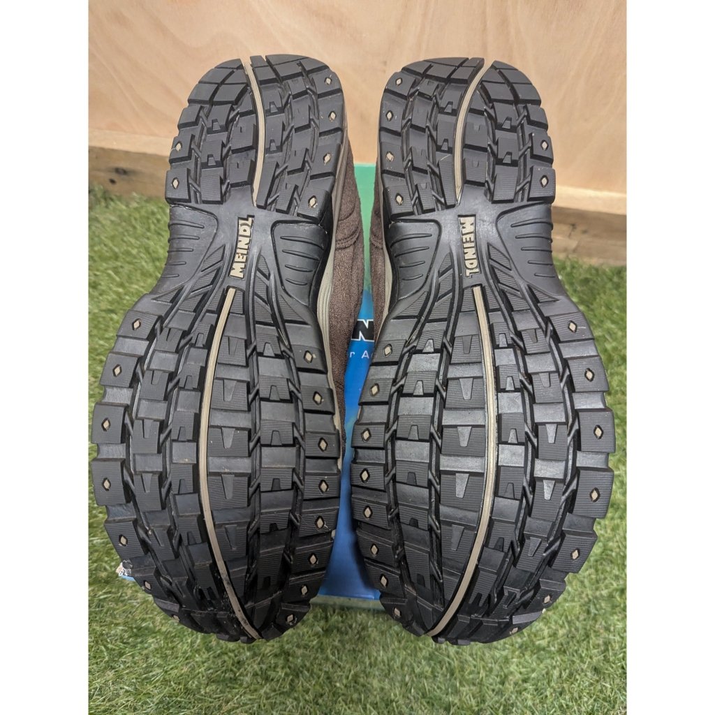 Brown Meindl Rapide GTX men's wide fit walking shoes showing aggressive black rubber tread sole