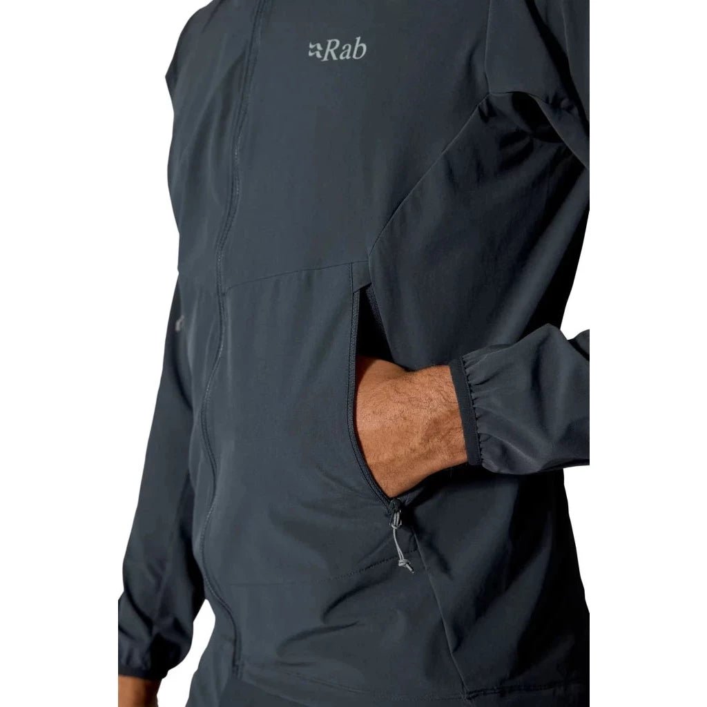 Detail shot of hand in vertical zippered pocket on Rab Borealis hoody